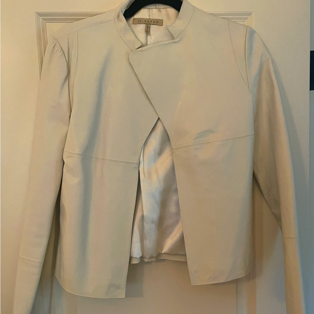 Vegan leather cropped white topper.  Clasp closure